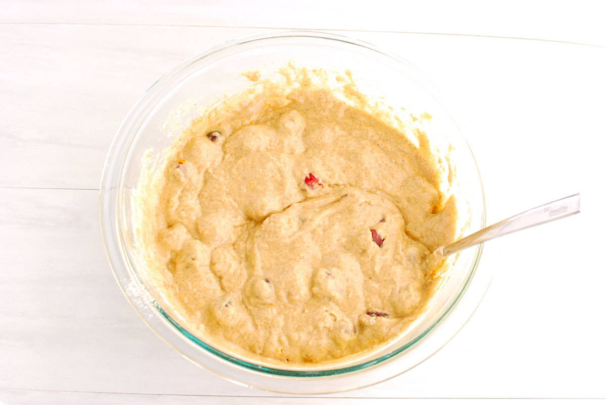 Muffin batter in a glass bowl.