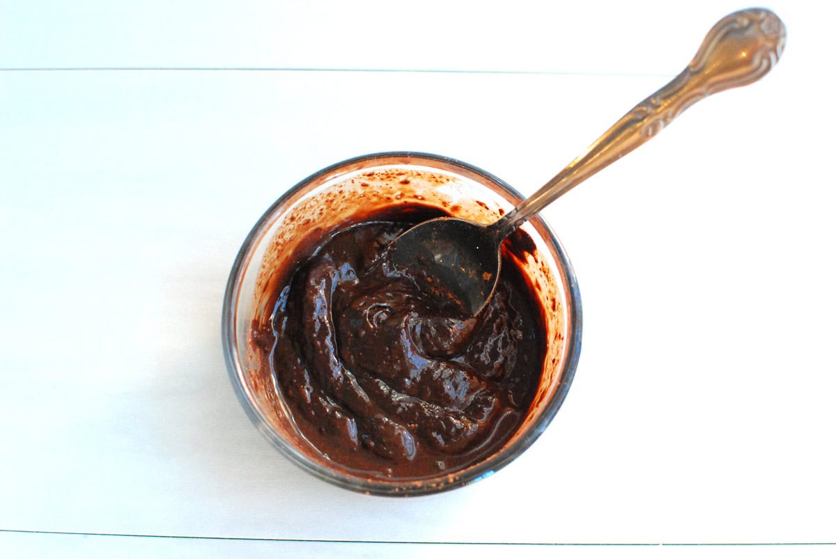 Cocoa powder, salt, and some milk stirred into the melted chocolate.