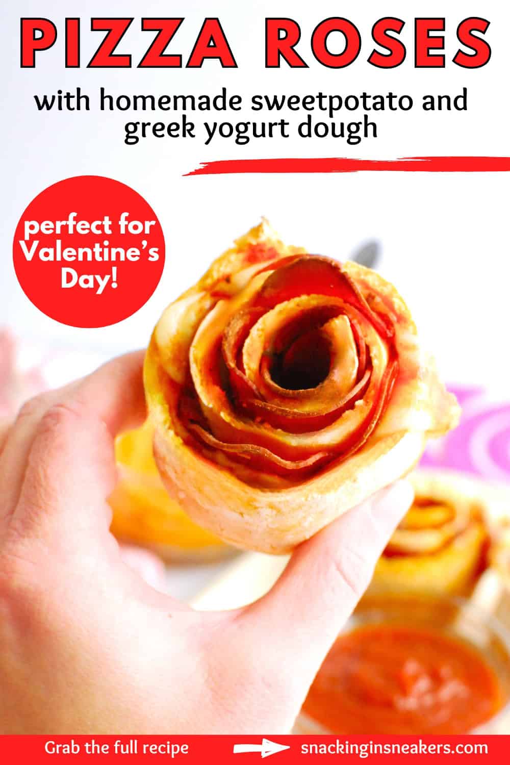 A woman's hand holding a pizza rose with homemade dough, with a text overlay with the name of the recipe.