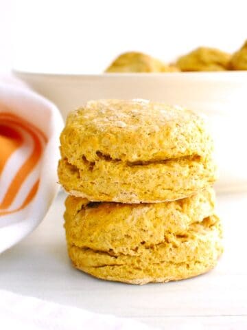 Two sweet potato biscuits stacked on top of each other.
