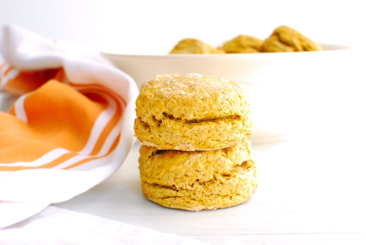 Two sweet potato biscuits stacked on top of each other.