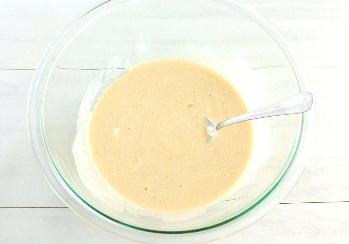 Yogurt, brown sugar, oil, egg, and vanilla mixed together in a bowl.