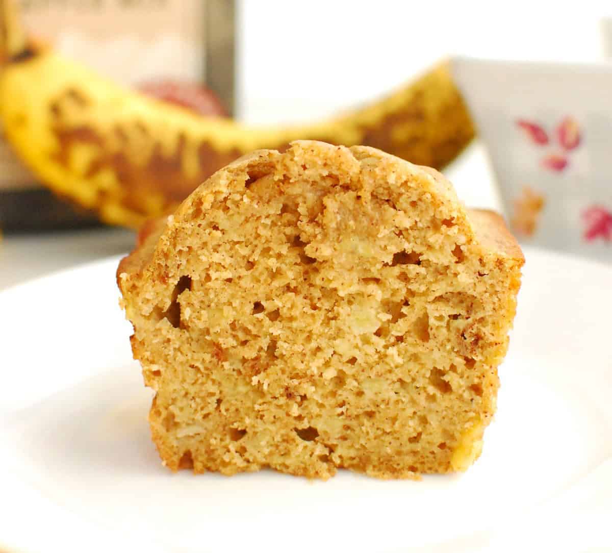 A cut slice of one-banana banana bread on a plate.