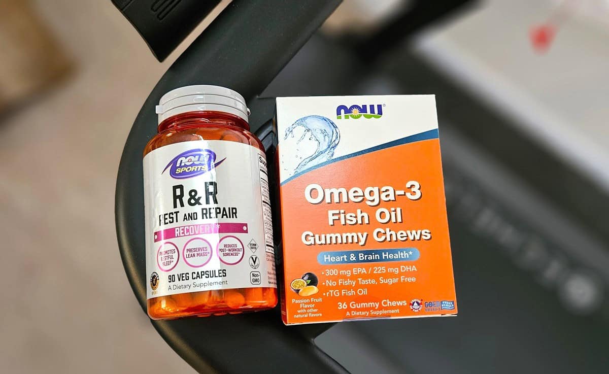 Two supplements on top of a treadmill.