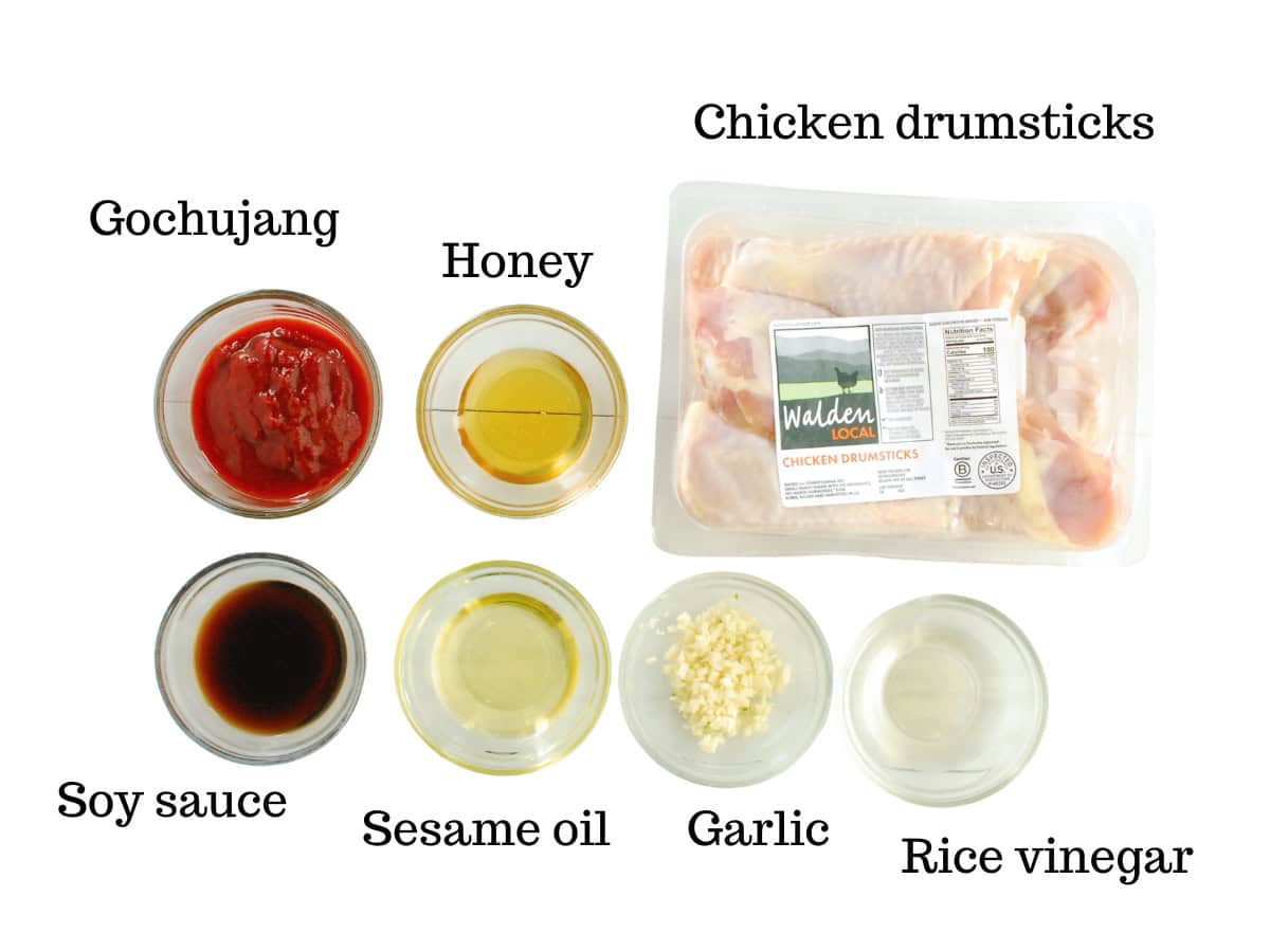 Chicken drumsticks, gochujang, honey, soy sauce, sesame oil, garlic, and rice vinegar.