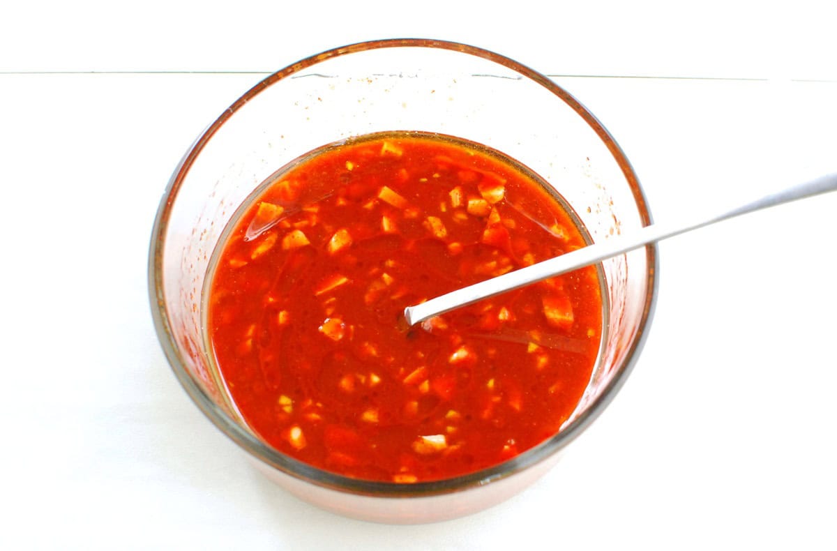 Gochujang marinade ingredients mixed together in a bowl.