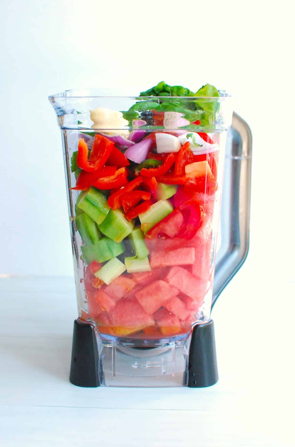All the gazpacho ingredients in a blender.