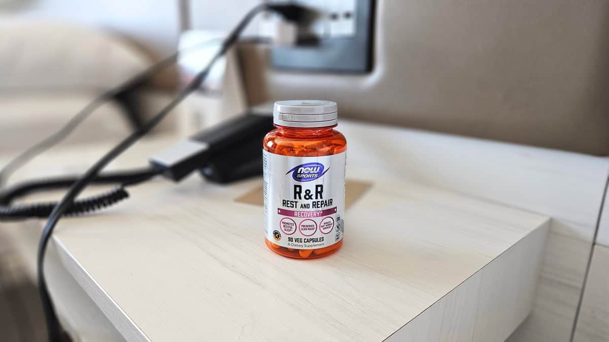 A recovery supplement on the nightstand at a hotel after a destination road race.