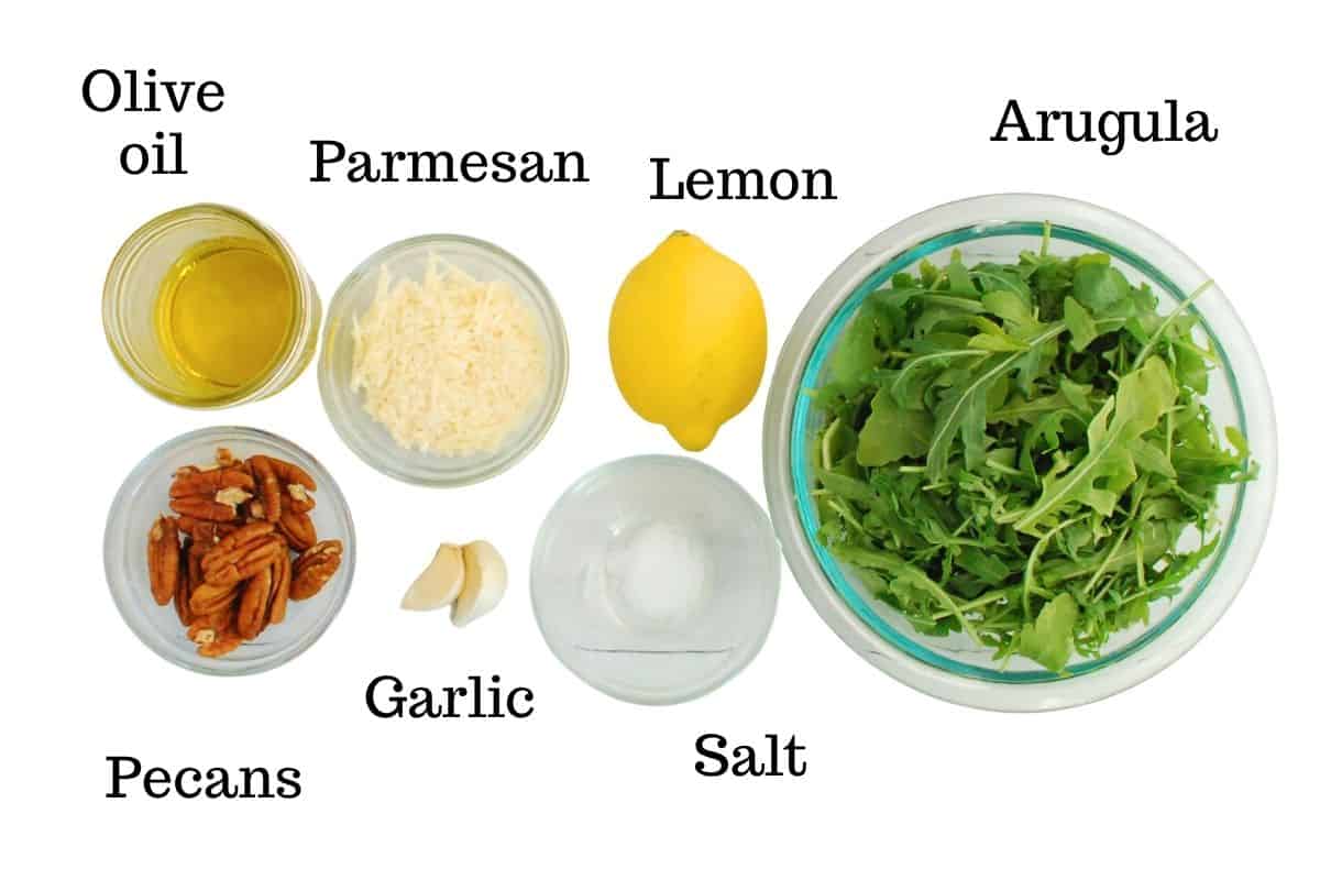 Arugula, lemon, salt, olive oil, parmesan, pecans, and garlic.